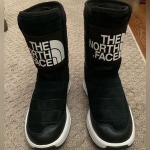 The North Face insulated suede/puffer snow boots.